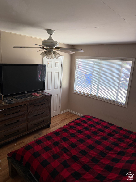 Bedroom featuring light wood-type flooring and a ceiling fan