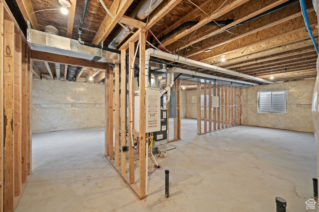 Below grade area featuring heating unit