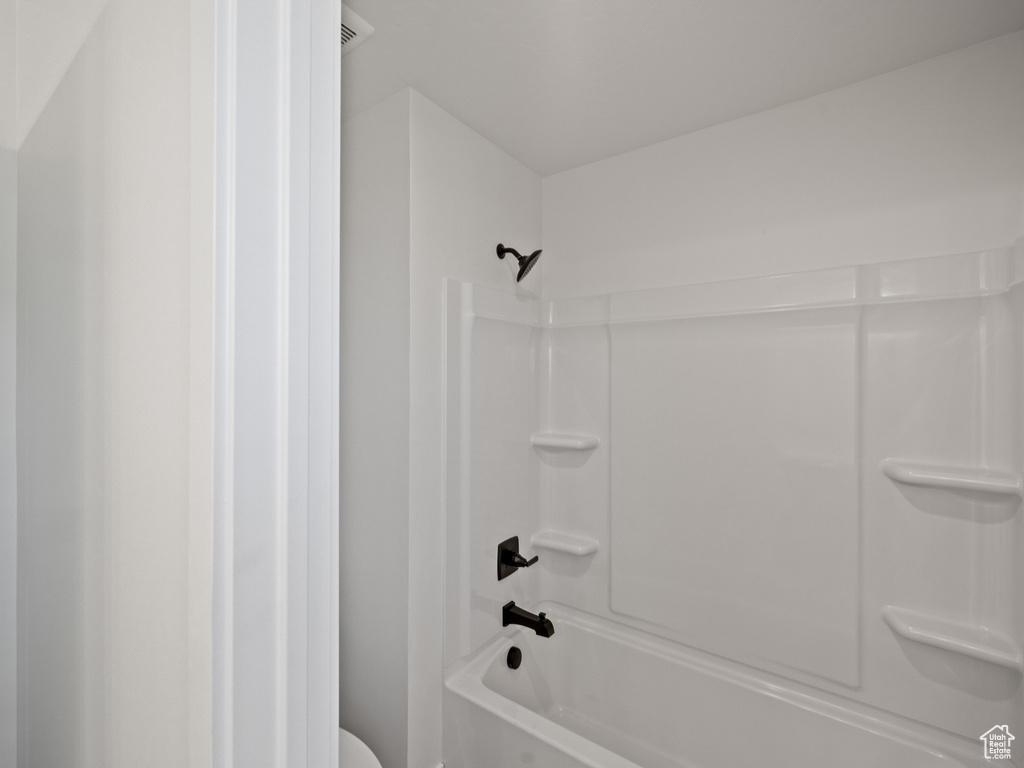 Bathroom with  shower combination and toilet