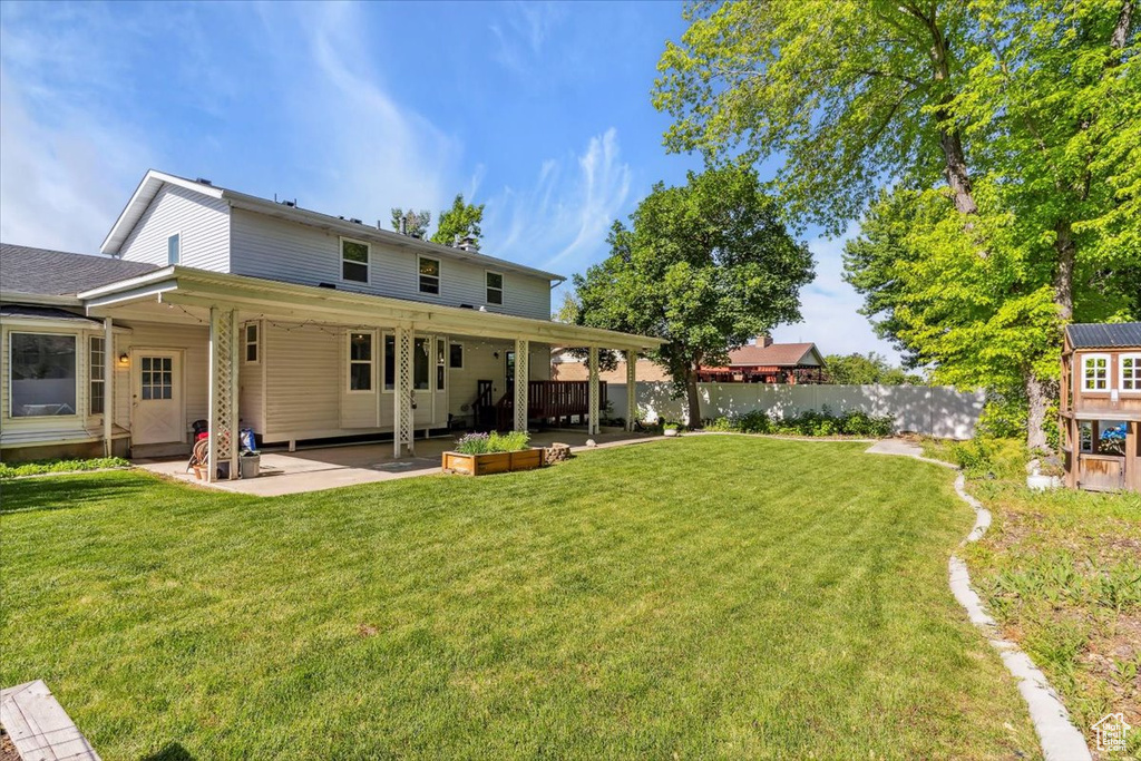 Back of house featuring a patio area