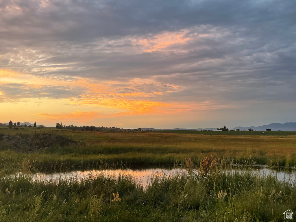 Nature at dusk with a water view