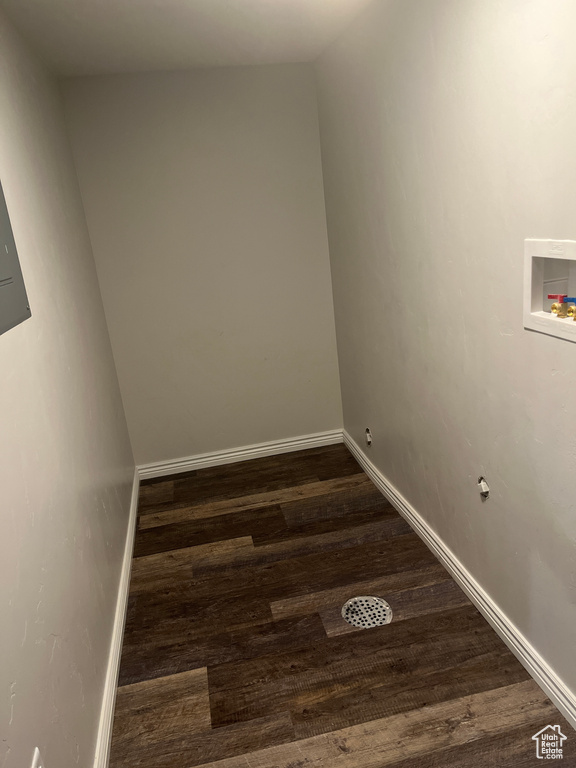 Laundry area featuring hookup for a washing machine, dark wood-style floors, and baseboards