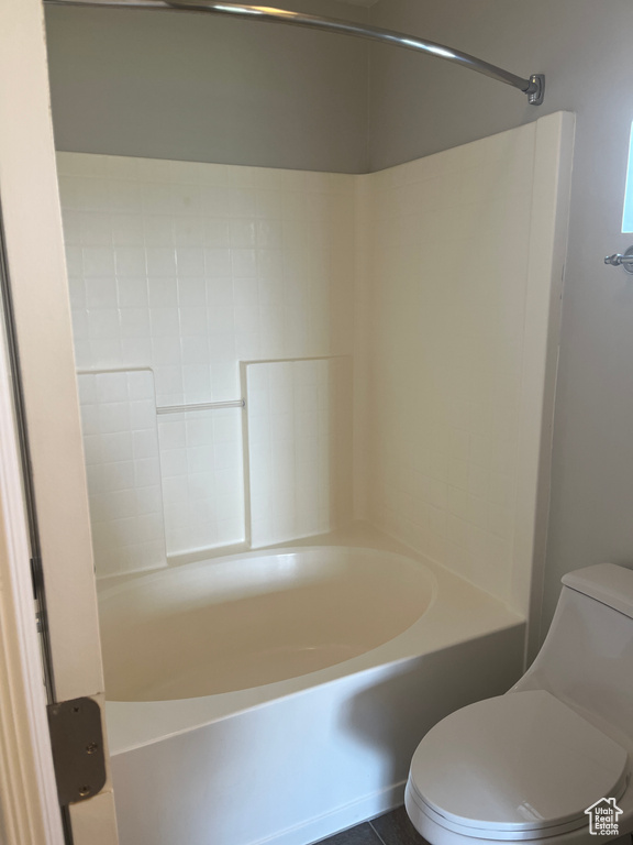 Full bathroom featuring toilet and bathtub / shower combination