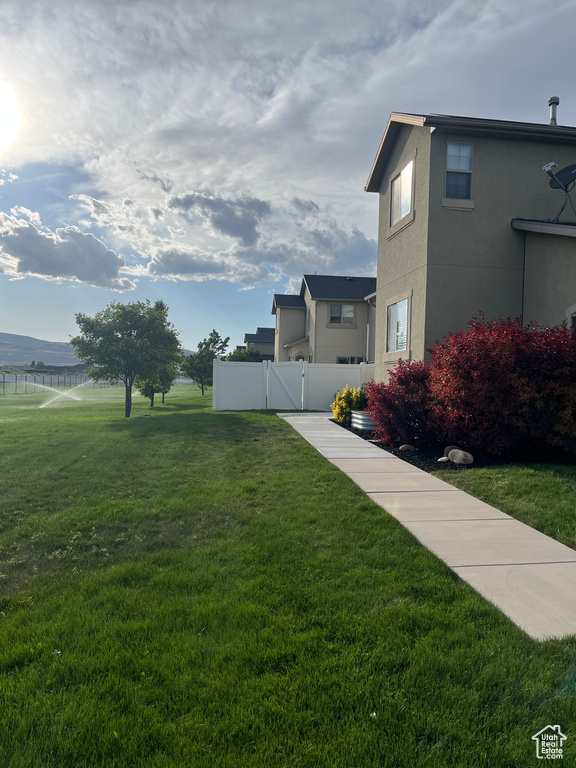 View of yard featuring a gate