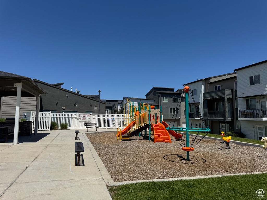Community jungle gym featuring a residential view