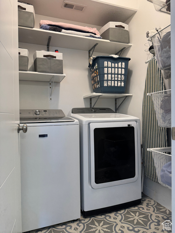 Laundry room featuring washer and dryer
