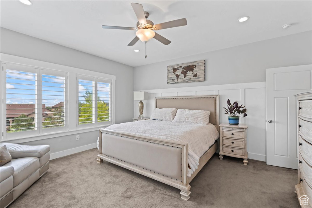 Bedroom featuring carpet flooring, recessed lighting, ceiling fan, and baseboards