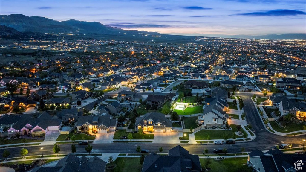 Aerial view at dusk of a mountain view and a residential view