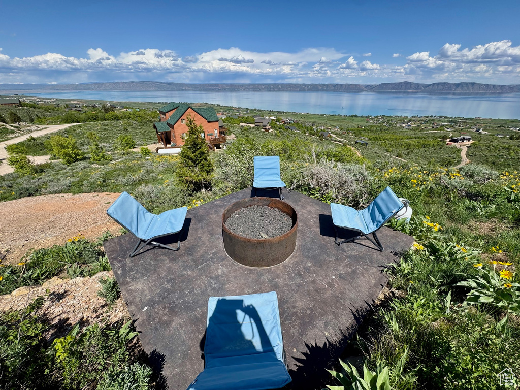 View of patio featuring a water view