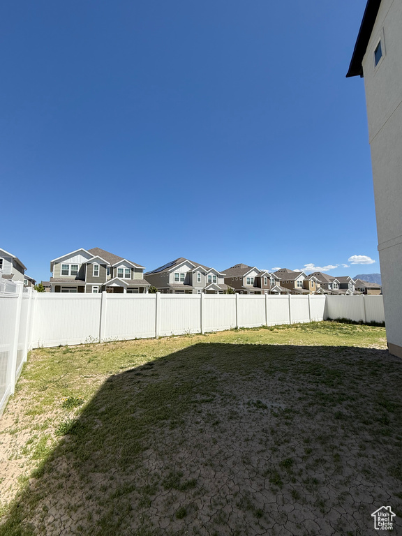 View of yard featuring a residential view