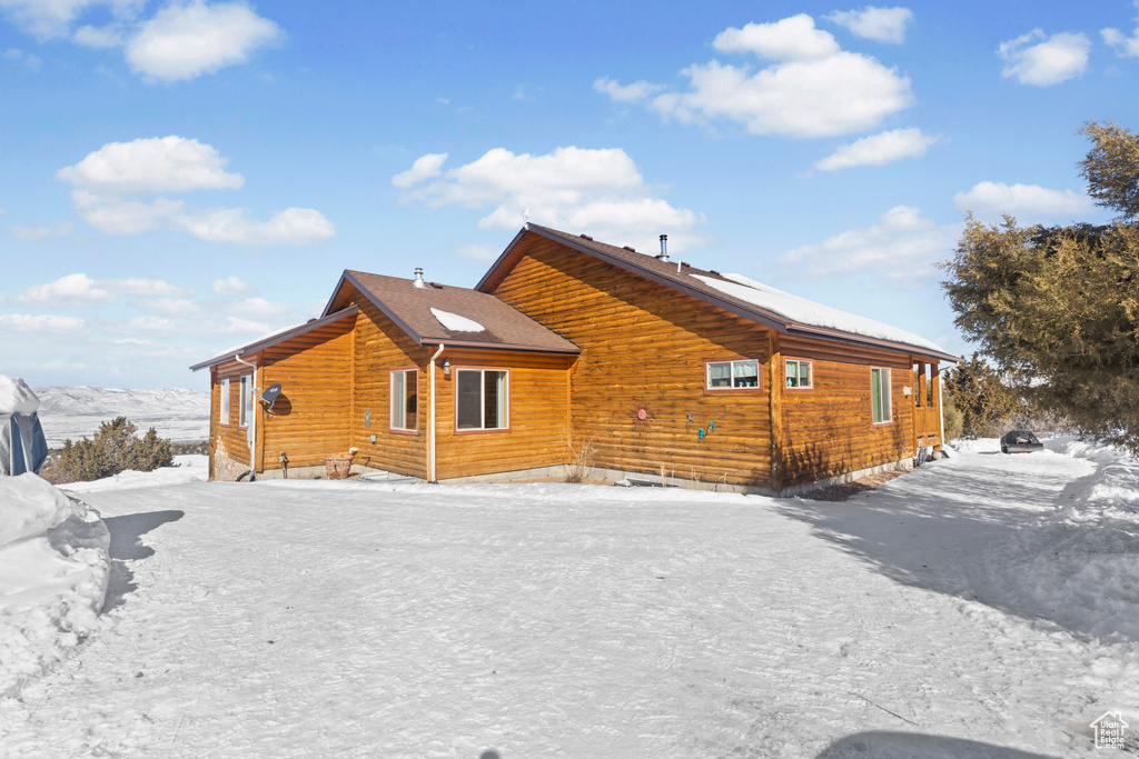 View of snow covered property