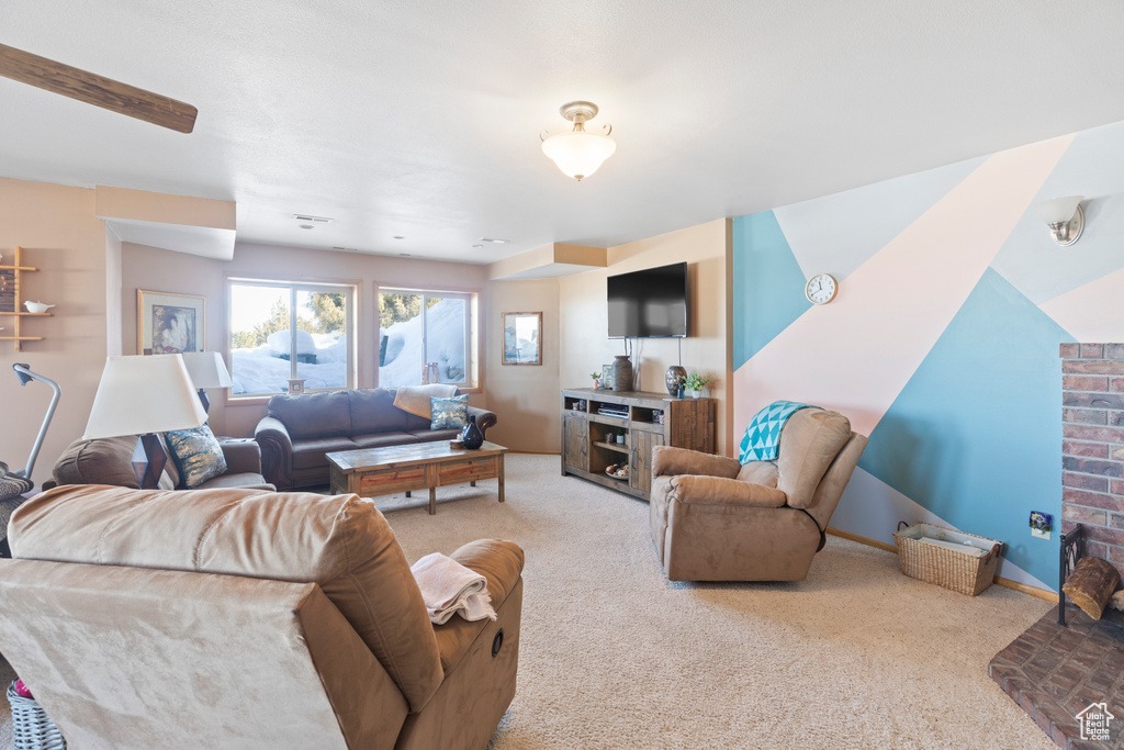 Living room featuring carpet floors