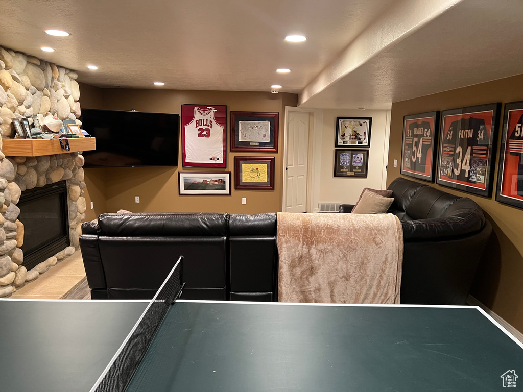Cinema featuring recessed lighting and a fireplace