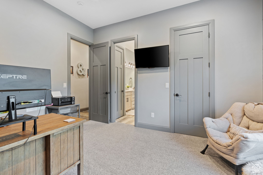 Office area with light colored carpet