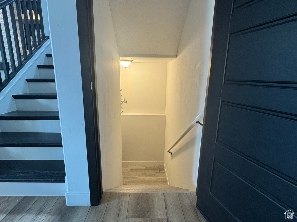 Stairway with wood finished floors
