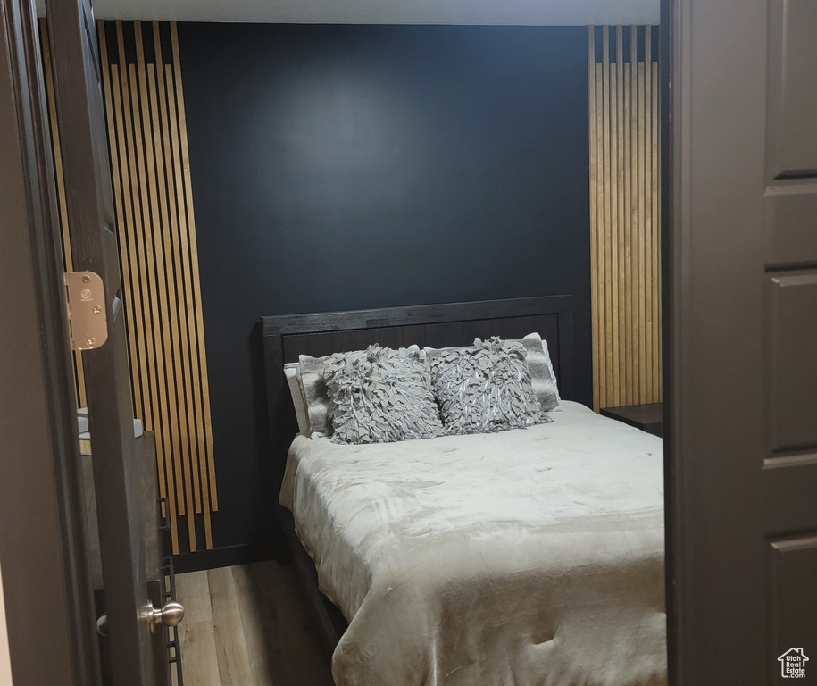 Bedroom featuring wood finished floors
