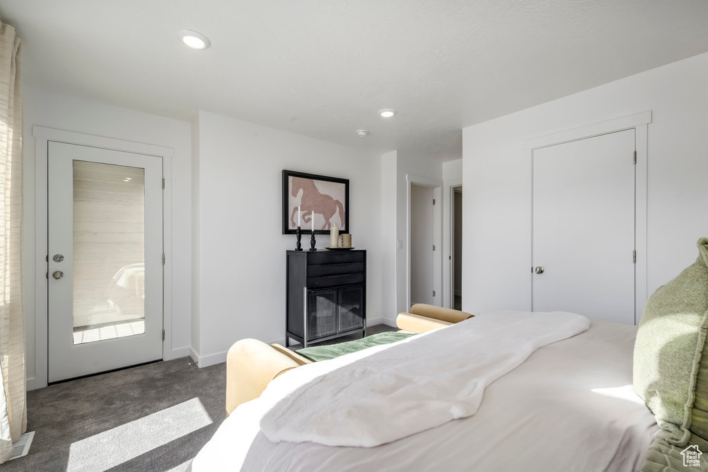 Bedroom featuring recessed lighting, carpet floors, and baseboards