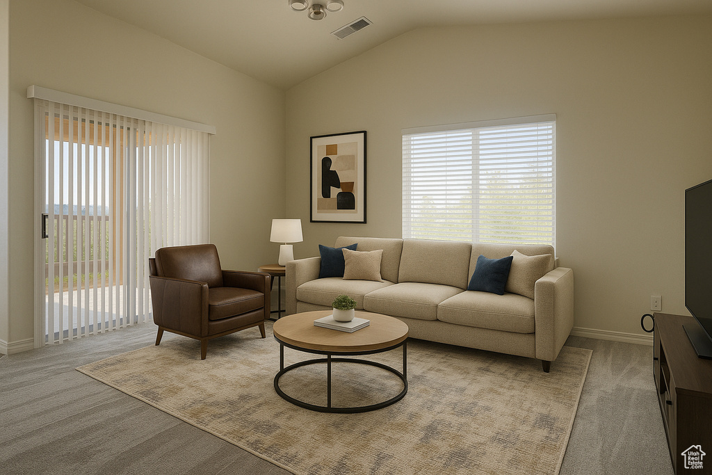 Living room with lofted ceiling, baseboards, and light colored carpet