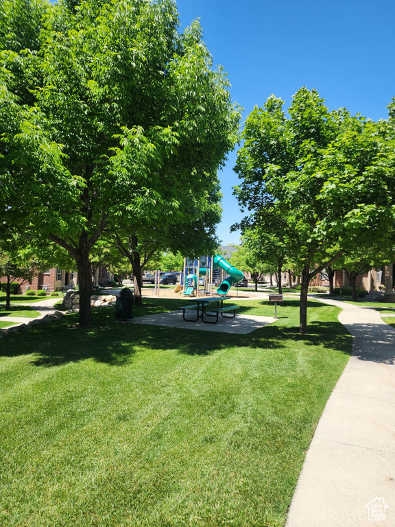 View of community with a yard