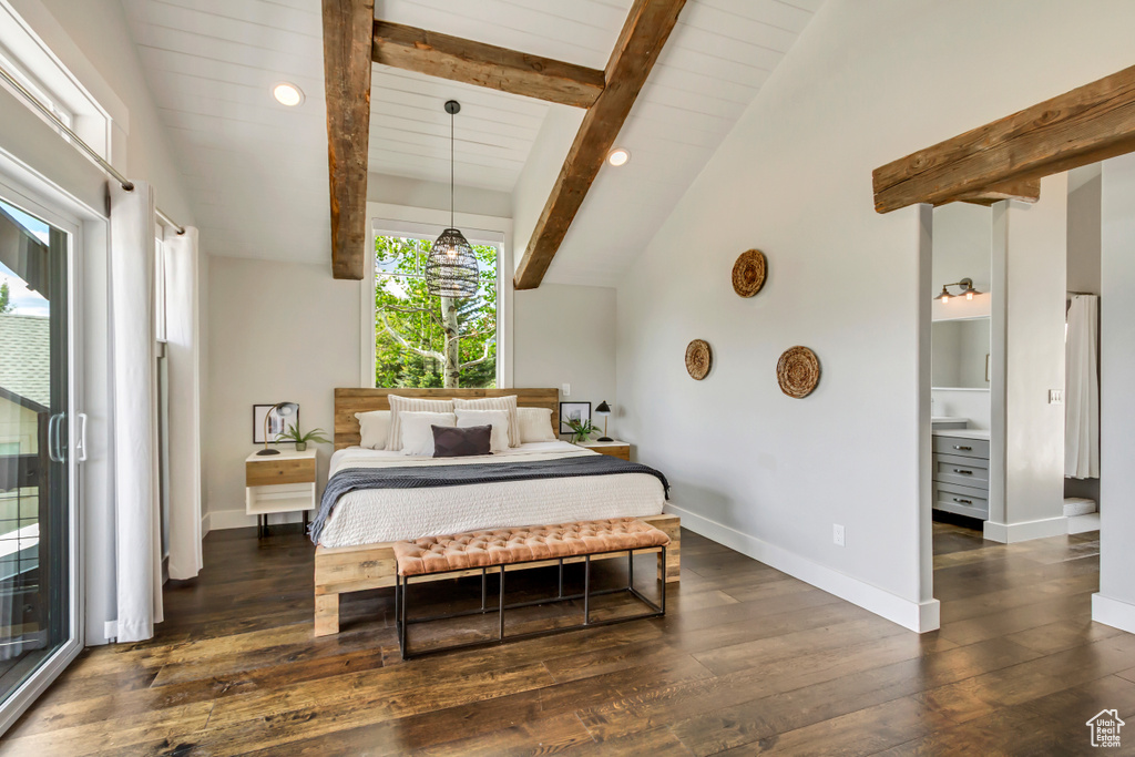 Bedroom featuring dark wood-style flooring and baseboards