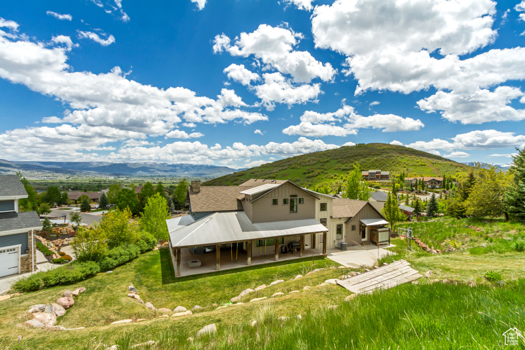 View from above of property featuring a mountain backdrop