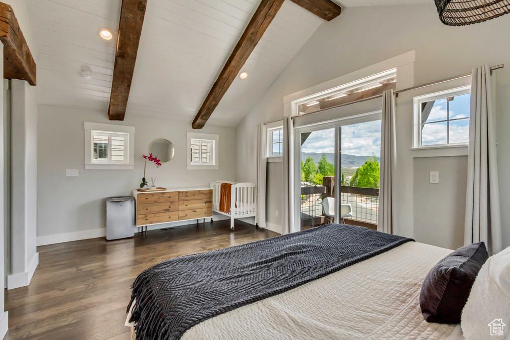 Bedroom with access to outside, dark wood-style flooring, multiple windows, baseboards, and recessed lighting