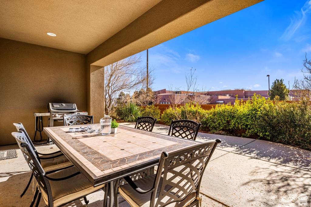 View of patio with outdoor dining space