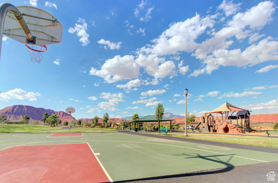 View of basketball court featuring a gazebo, a mountain view, and community basketball court