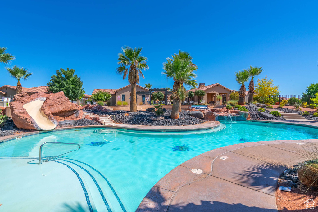 Community pool with a water slide
