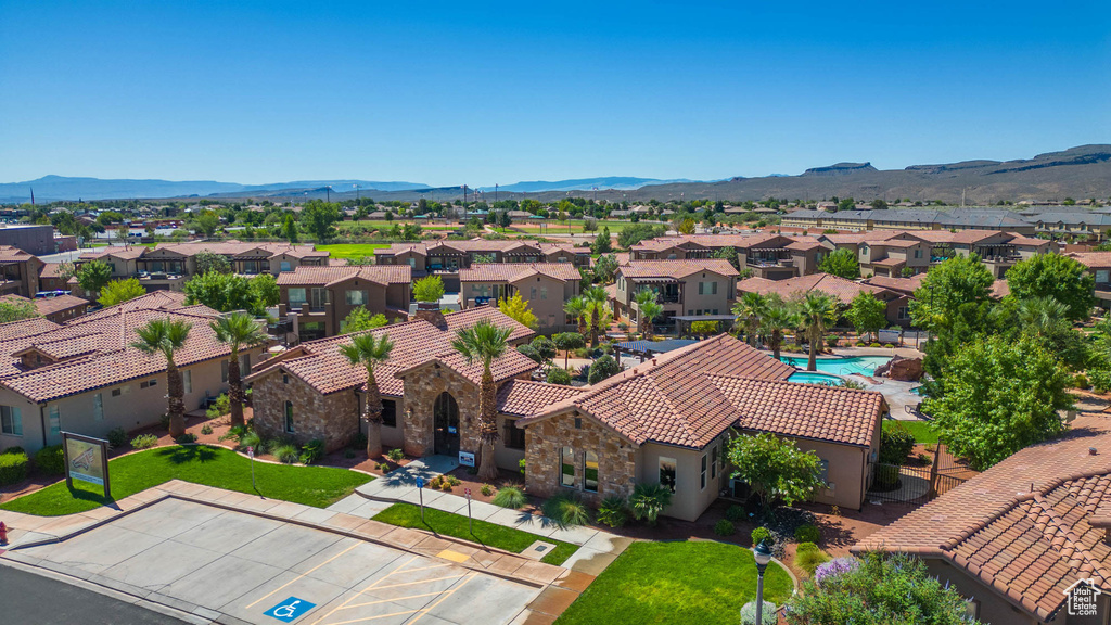 Aerial view of residential area with a mountainous background