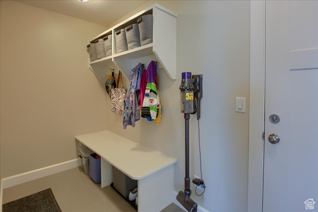 Mudroom featuring baseboards