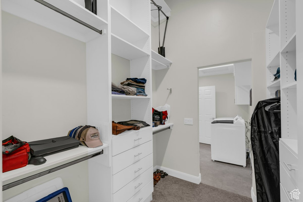 Walk in closet with washer / dryer