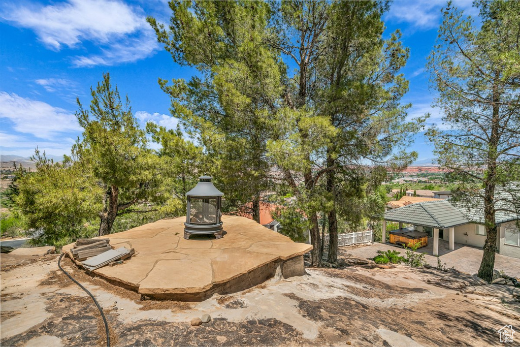 View of yard with a patio