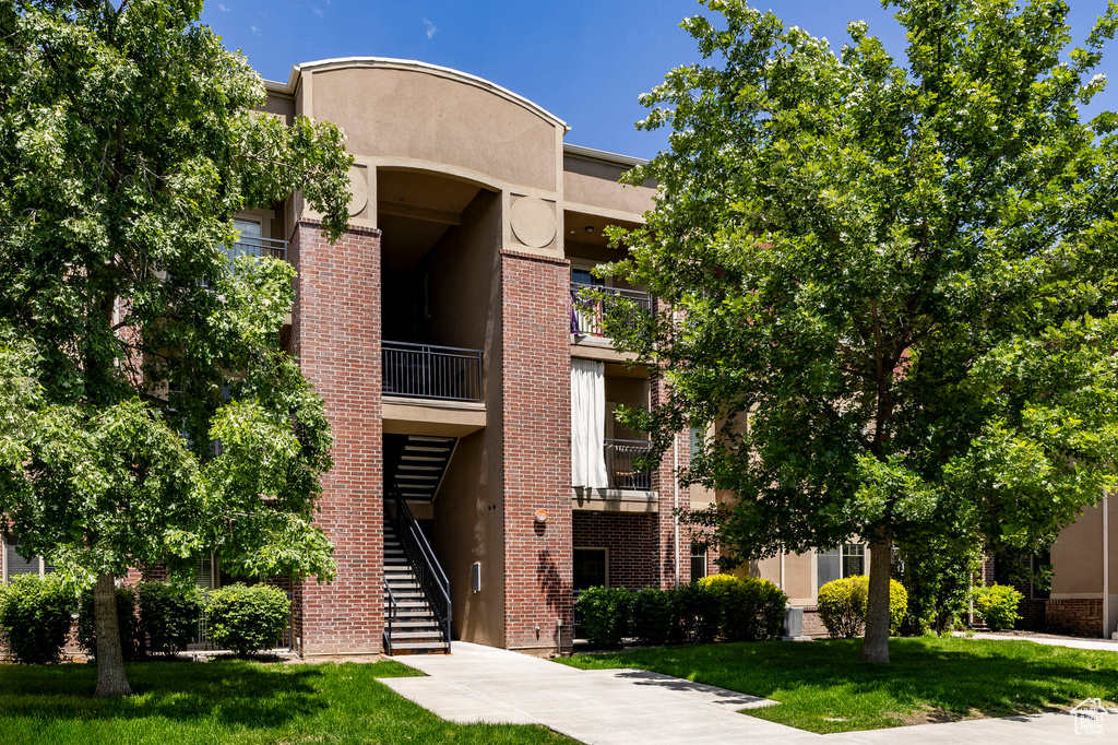View of building exterior featuring stairs