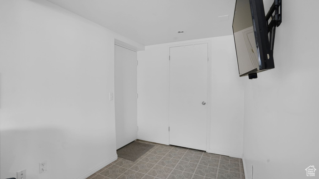 Empty room with baseboards
