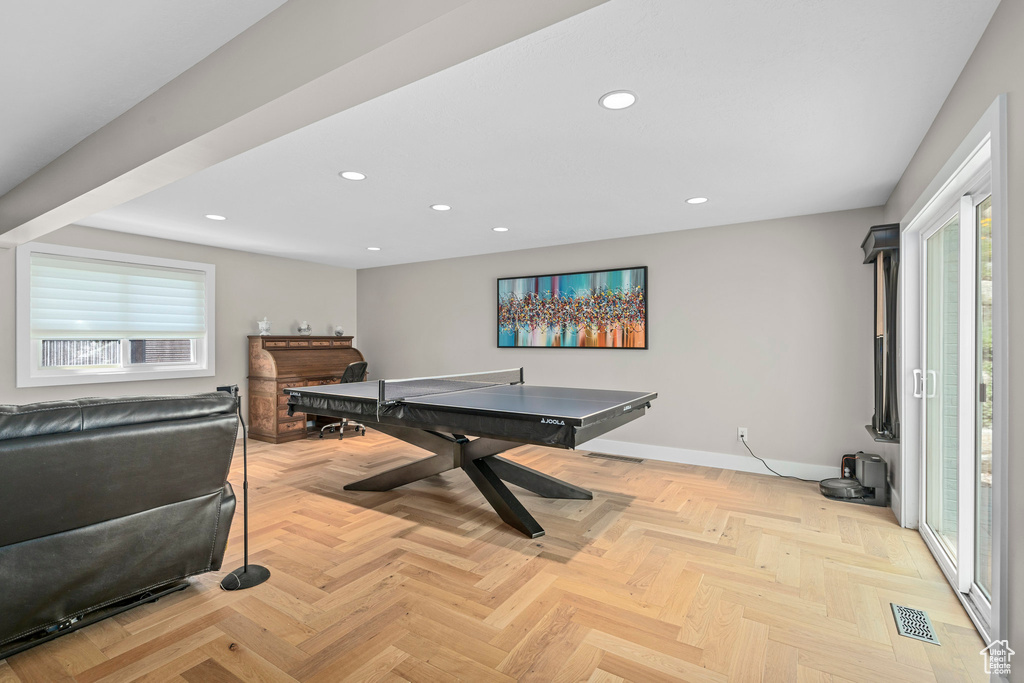 Rec room featuring plenty of natural light, recessed lighting, and baseboards