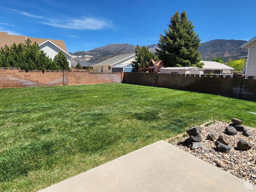 View of yard featuring a mountain view