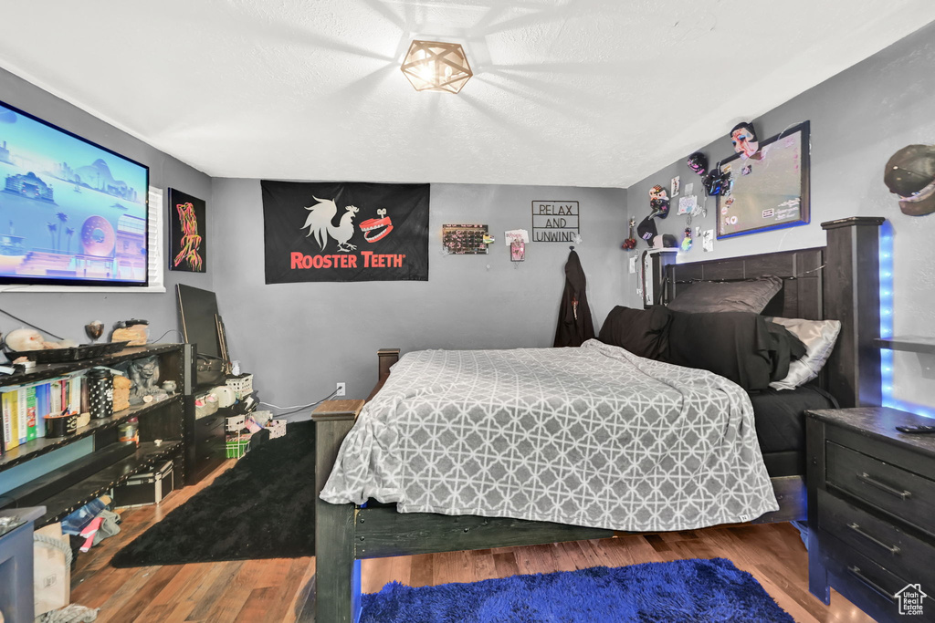 Bedroom featuring wood finished floors