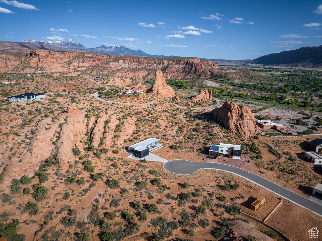 Aerial overview of property\'s location with mountains