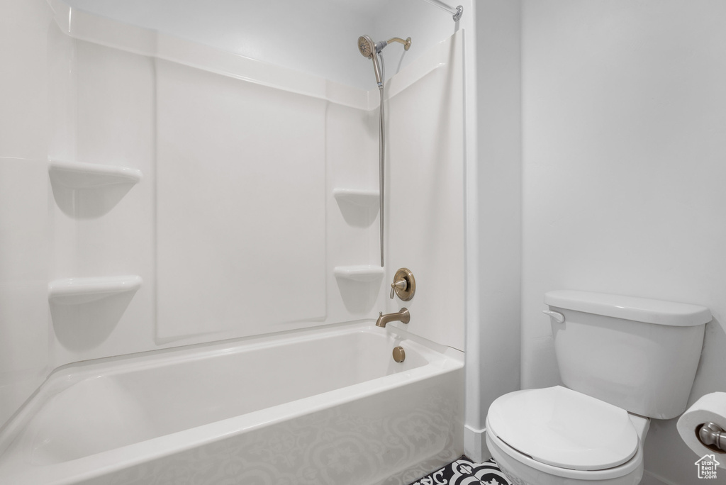 Full bath with toilet and  shower combination