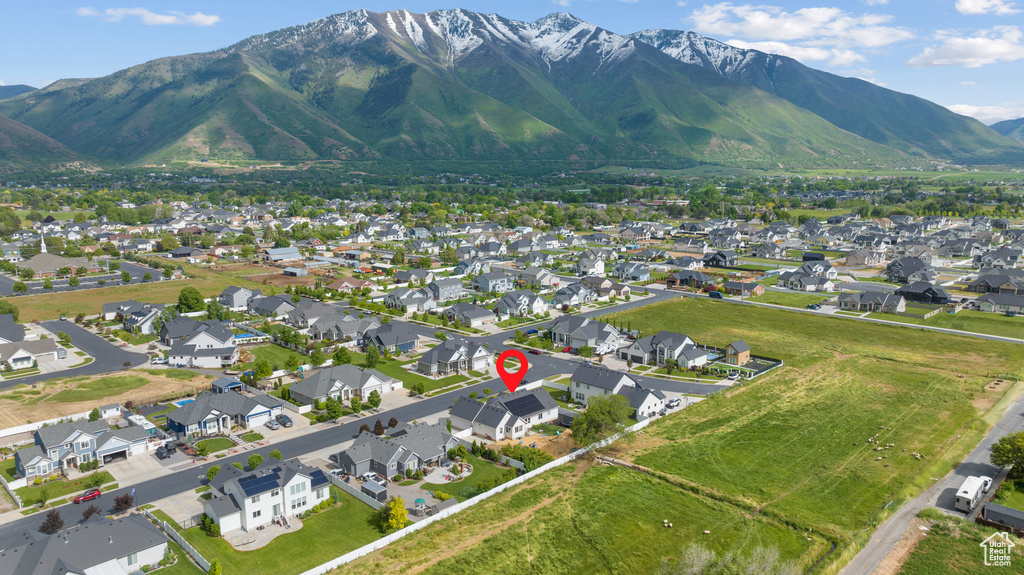 View of property location with a mountainous background and nearby suburban area