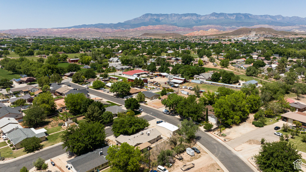 Aerial view of residential area featuring a mountain backdrop