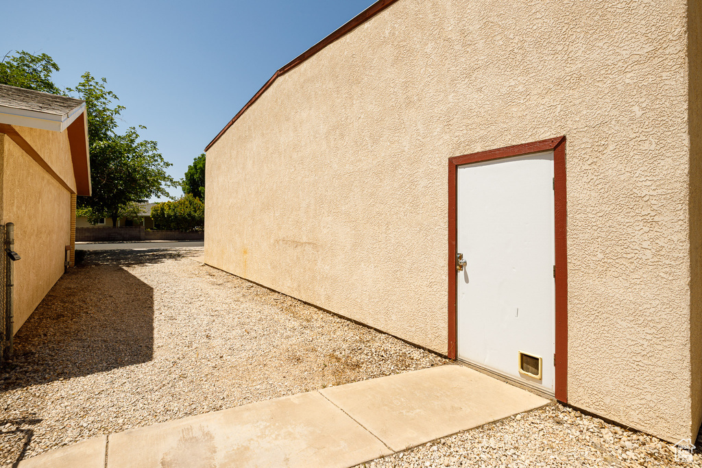 View of home's exterior featuring stucco siding