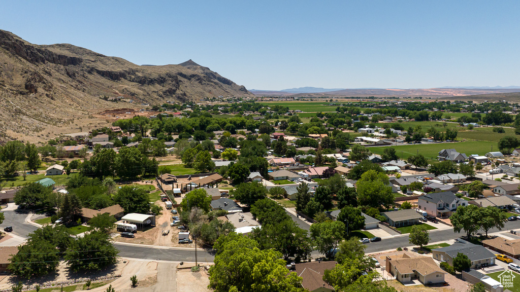 Aerial view of residential area with a mountainous background
