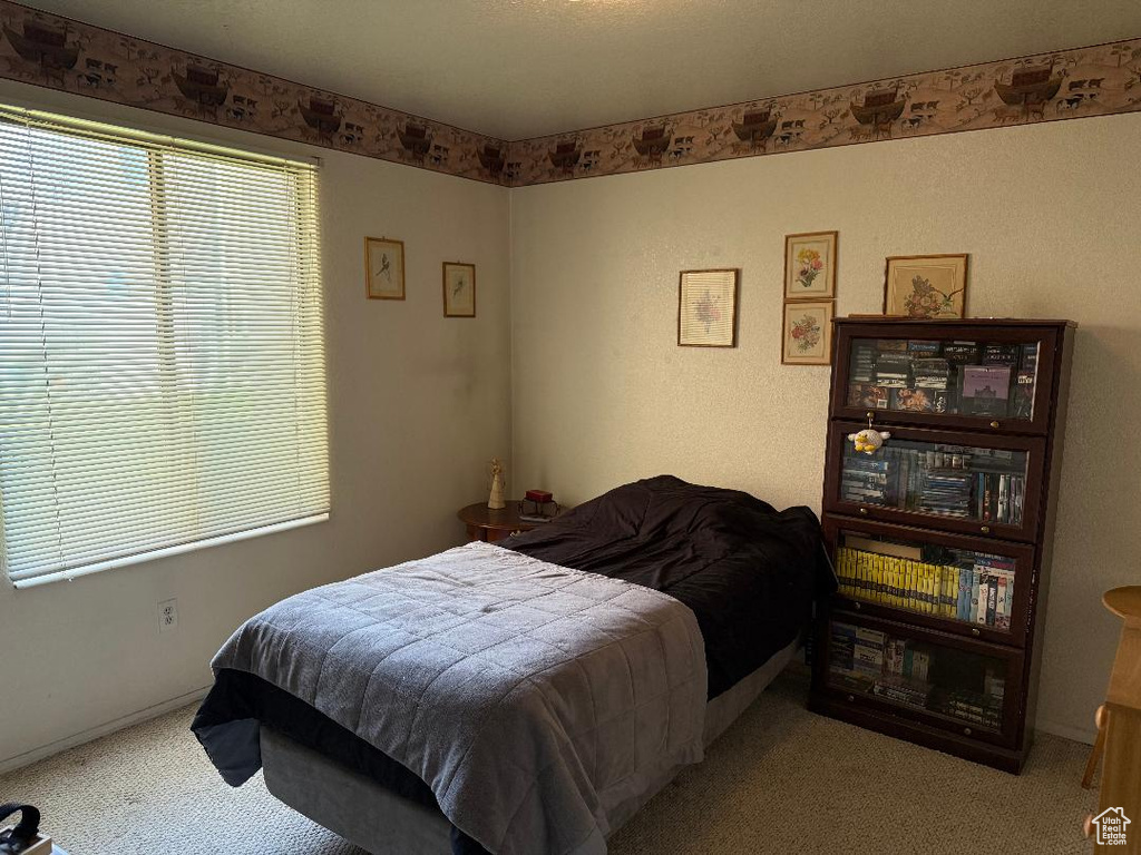 Bedroom featuring carpet