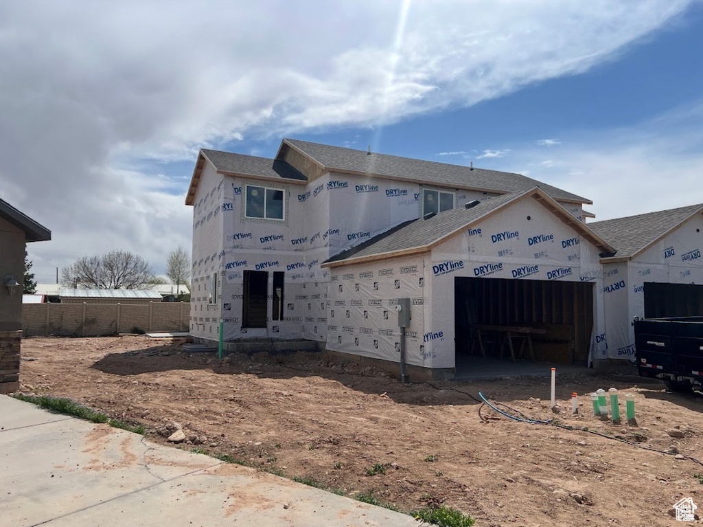 View of front of home with an attached garage