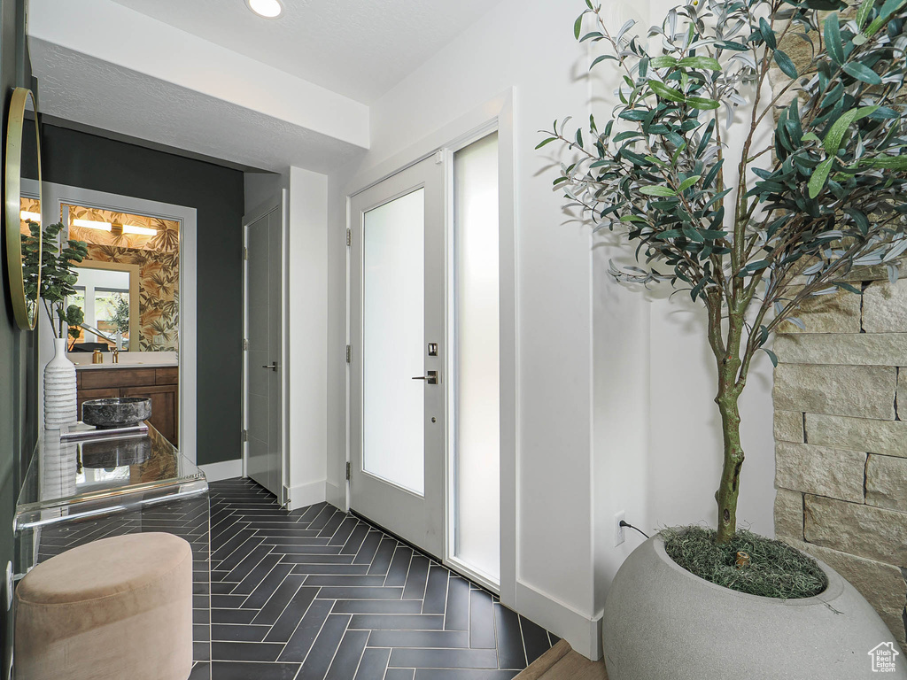 Foyer with baseboards