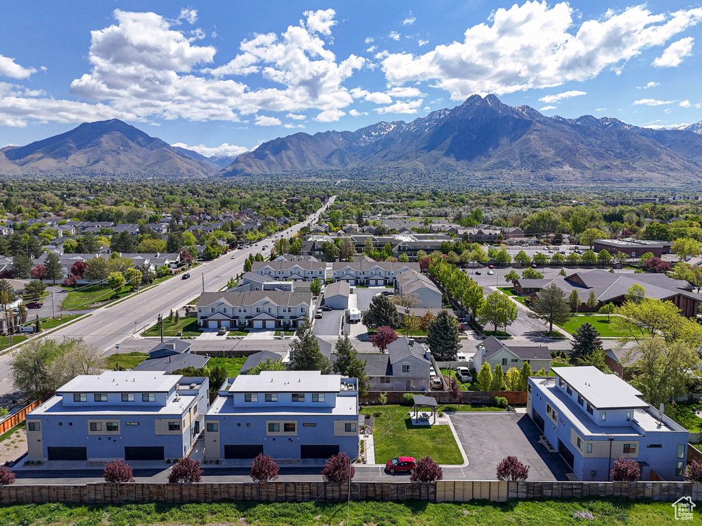Aerial view of residential area featuring mountains