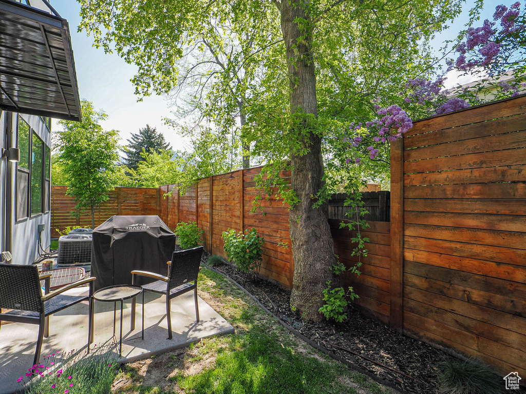 Fenced backyard featuring a patio area