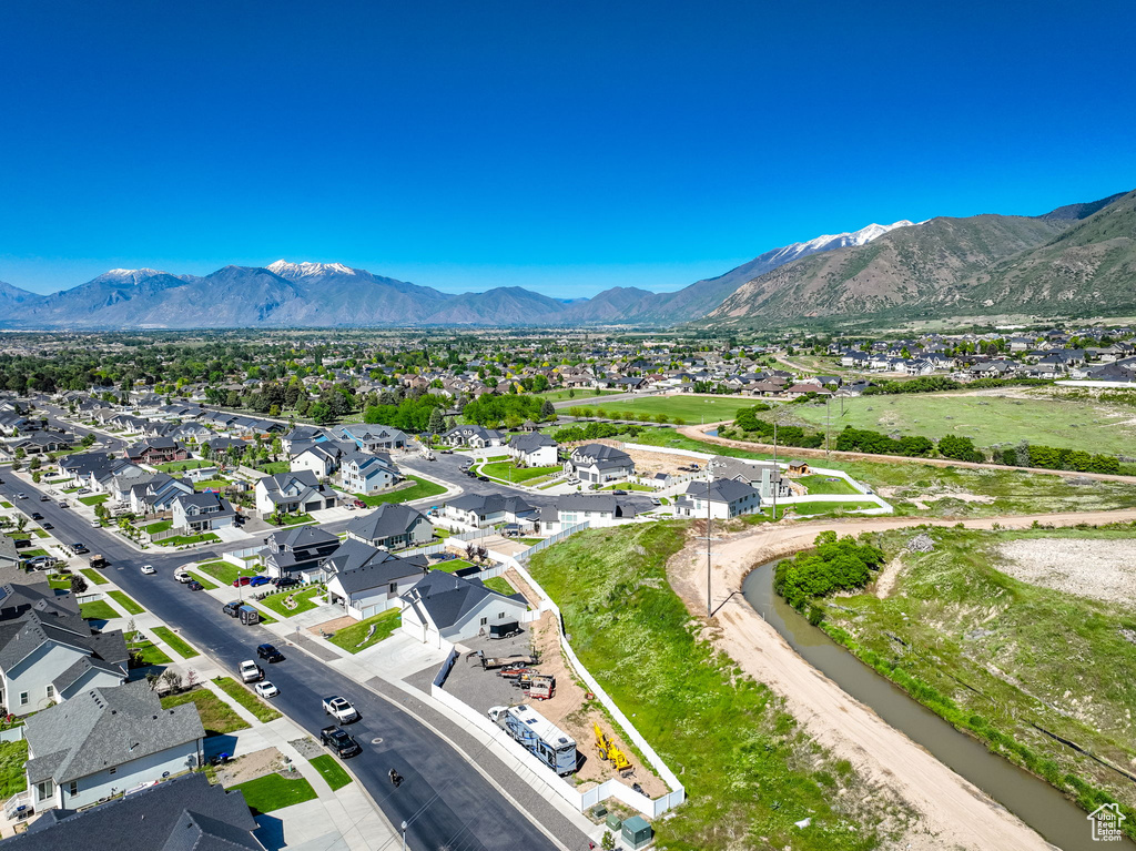 Aerial view of residential area with a mountainous background